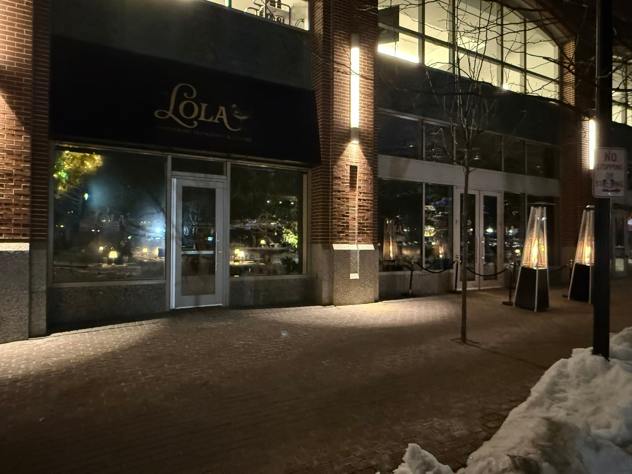 The Lola: The Lola's storefront at night
