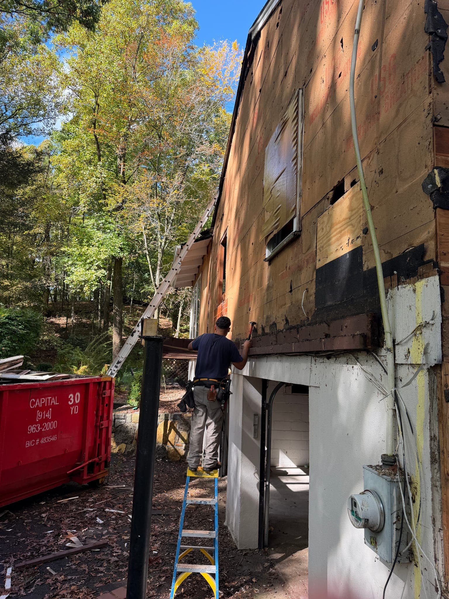 65 Windmill Road: Trim coming off above the lower-level garage